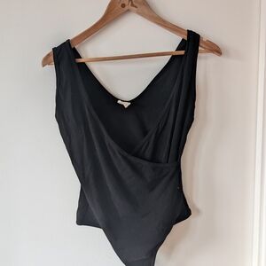 Criss Cross Sleeveless Black Body Suit